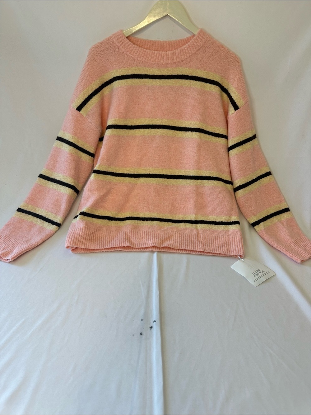 Striped Pink Crewneck Sweater with Black and Yellow Accents